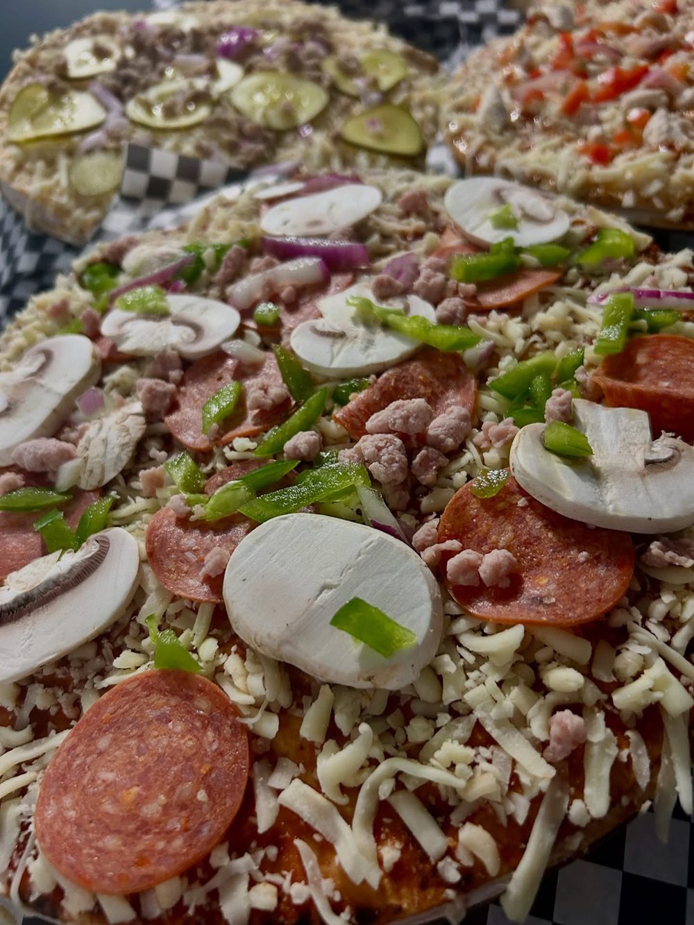 A loaded specialty pizza