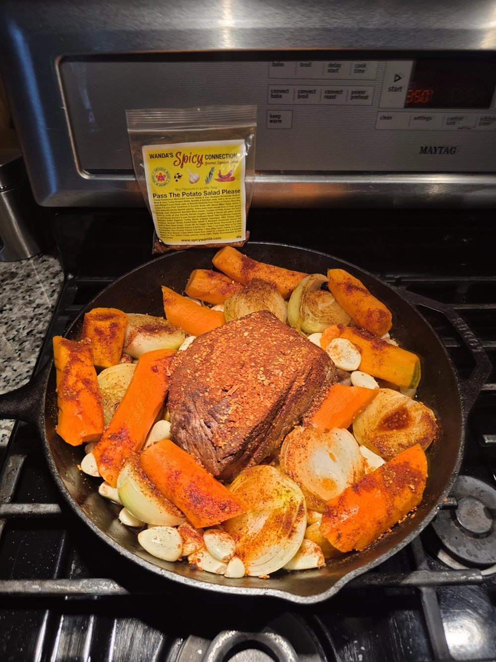 A sheet pan of roasted chicken and sweet potatoes
